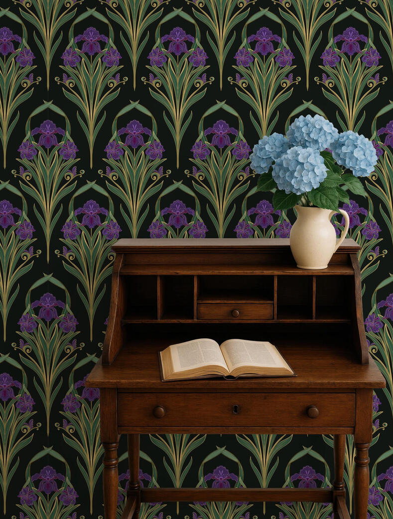 Untitled Art Nouveau iris wallpaper with purple flowers and elegant green foliage displayed behind a vintage writing desk